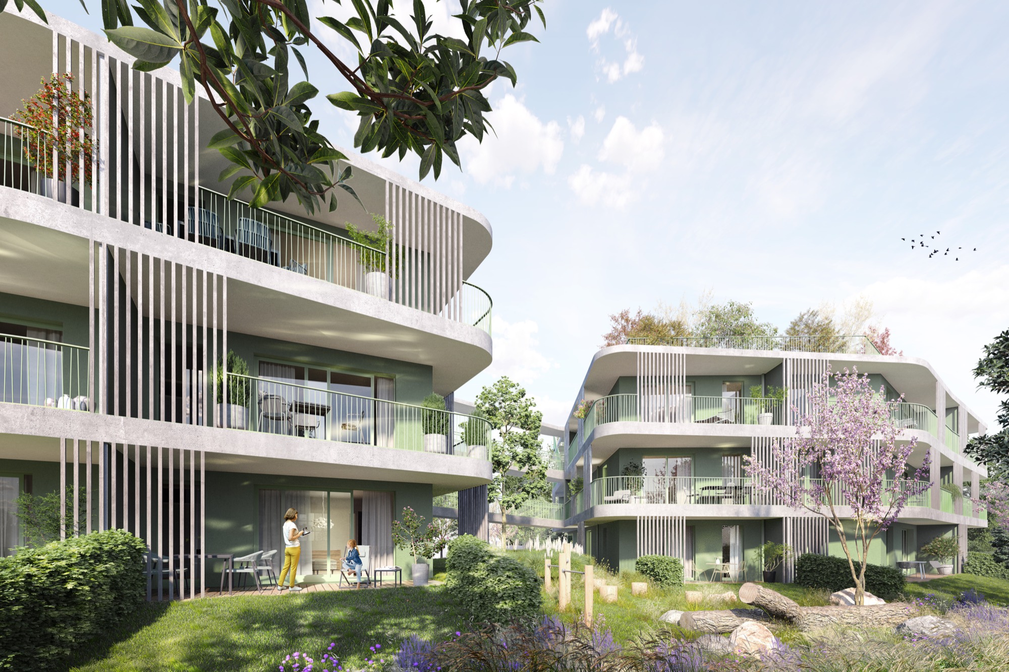 Gartenperspektive zwischen den Baukörpern mit begrünten Freiräumen